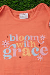 BLOOM WITH GRACE" ORANGE RUFFLE BABY ROMPER