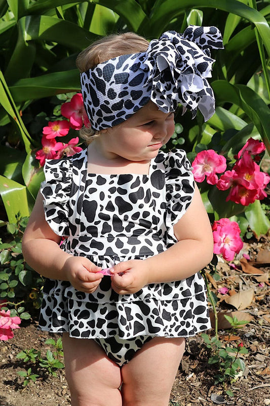 MULTI- COW SPOTTED PRINT BABY ONESIE W/ SNAPS.