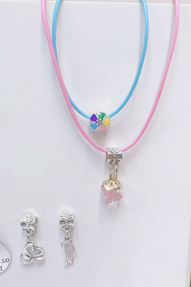 COPY OF PIECE NECKLACE & CHARM SET.