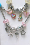 COPY OF PIECE NECKLACE & CHARM SET.