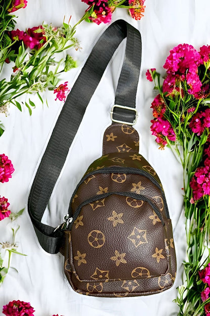 BROWN STAR PRINTED SLING BAG.