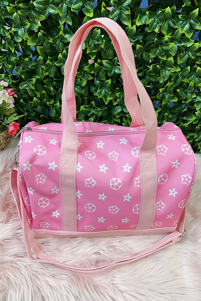 WHITE STAR ON PINK SMALL DUFFLE BAG WITH STRAP.