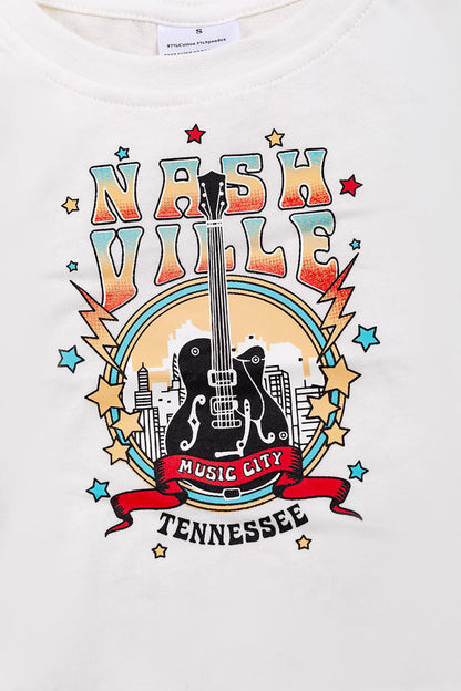 NASHVILLE LIVE MUSIC" IVORY GRAPHIC TEE WITH FRINGE